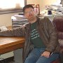... Success!  Pastor Ken Henry shows off the new desk in his study.