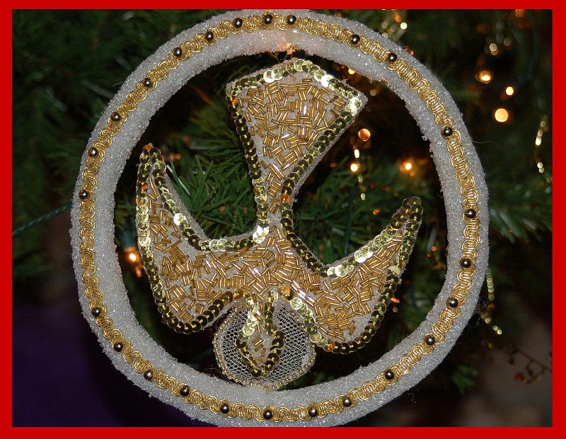 Chrismon.jpg - A Chrismon shows the dove of peace.