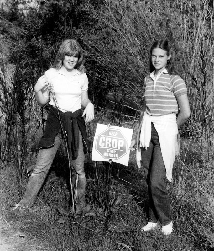 1983-7.jpg - Lisa Thorn (left) and Renee Reece, both of the Stone Church Youth Fellowship, take a break. (1983)