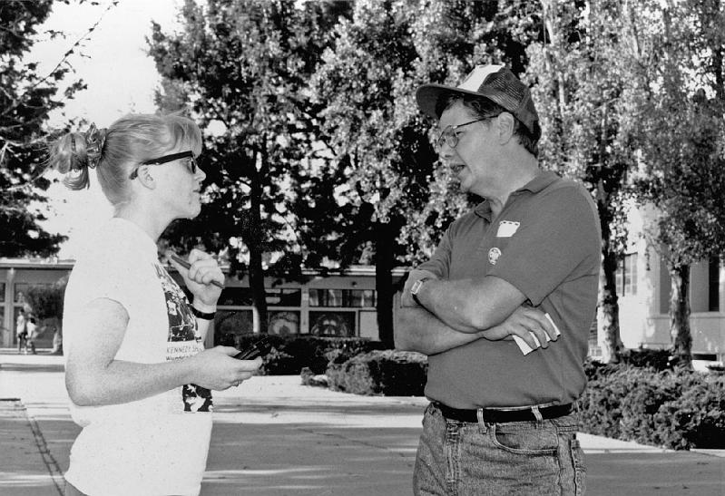1988-1.jpg - Stone Church youth member Lisa Thorn, working as an intern for the Willow Glen Resident, interviews Arrangements Coordinator (and Stone Church member) Ted Becker, as preparations are underway for the 1988 Crop Walk.