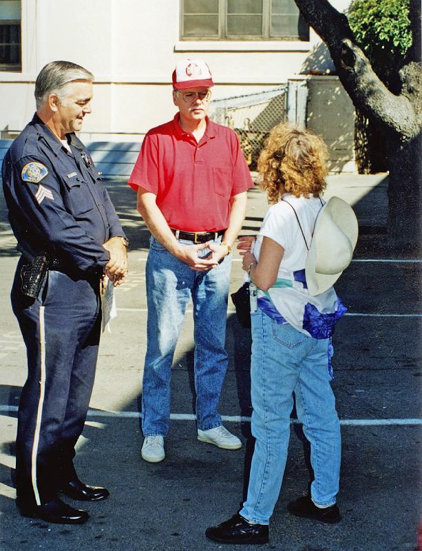 1994-2.jpg - Arrangements Coordinator Ted Becker reviews plans with a safety officer and an interested participant.  (1994)