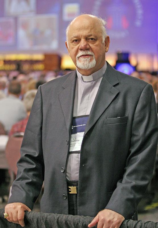 151.jpg - His Eminence Avak Asadourian, Archbishop of the Armenian Apostolic Church of Iraq, prepared for the afternoon plenary. Photo by Danny Bolin