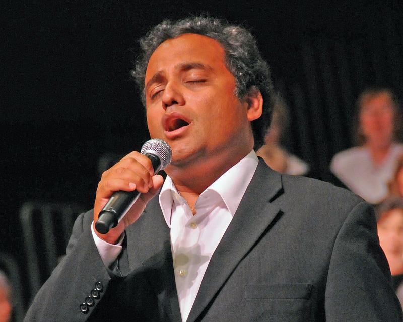 233.jpg - Pedro Betancourt sang the solo part of Hear Me Redeemer during Sundays opening worship service. Photo by Joseph Williams