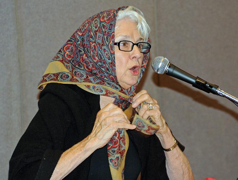622.jpg - Mary Frances Chupick Bennett, who accepted the Angell Award at the Presbyterian Writers Guild Luncheon on Thursday, appeared in character and performed a monologue from her historical novel,  Invitation to Cat Springs . Photo by Joseph Williams