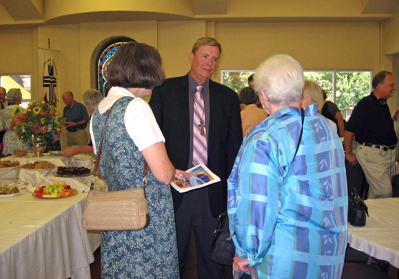 IMG_0712.jpg - The Rev. Bob Bowles visits with Sue Williams and Jody Pabst.
