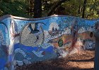 DSC 0132  The playground has a wall bordering the steep slope down to the creek.  The entire wall is covered in mosaic; part of that is shown here.