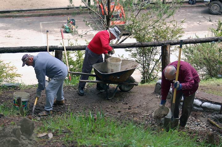 DSC_0074.JPG - Michael, Bruce and Bill moving gravel, to fill in behind a bulkhead (not shown).