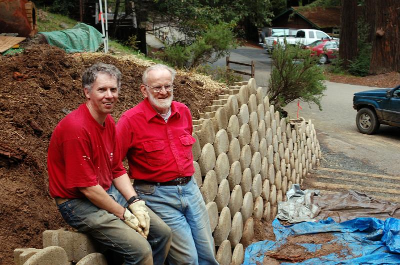 53.jpg - Gabe and Rod take a break at the nearly finished wall project.