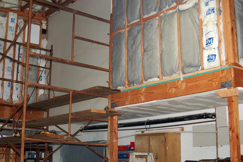 DR_0030.JPG - The firewall begins several feet above the ground, so all work is done while standing atop a scaffold.