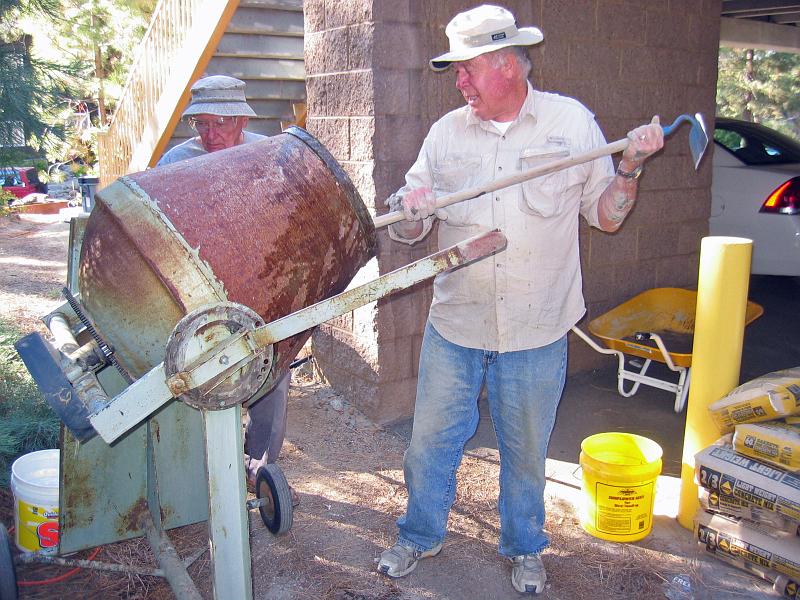 117_1748.jpg - Bruce Raby  and Lawrence Summers mixing cement.