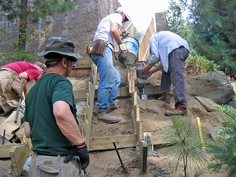 117_1758.jpg - John and Bruce pouring the piers.