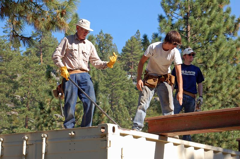 211.jpg - Art, David and Gordon Meacham ensure that the I-beam is properly placed.