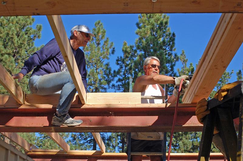 302.jpg - John and Michael install the roofing framework.