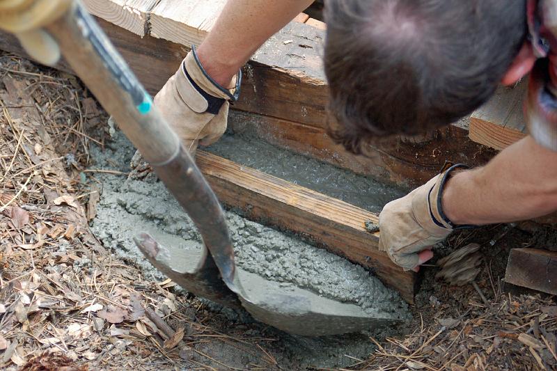 DSC_0020.JPG - Fresh concrete is laid, to become a foundation for a post at the Low Deck.