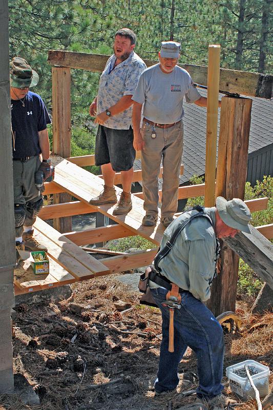 DSC_0029.JPG - At the High Deck, all needed demolition has been done.  Here Leland, Mark, David and Lawrence work to build a scaffold, from which they will begin the new structure.
