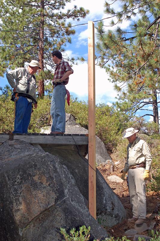 DSC_0038.JPG - Lawrence, Chris and Art inspect their new supporting post, at the corner of the Low Deck.