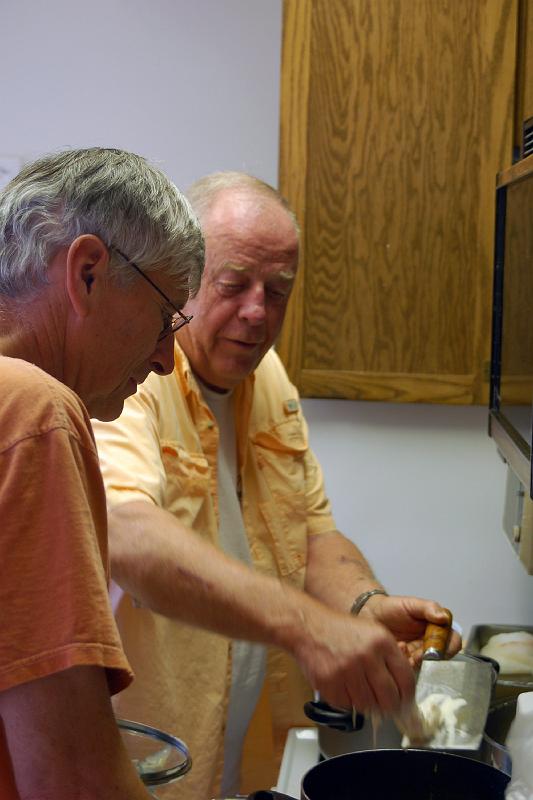 DSC_0099.JPG - At the end of a workday, John and Lawrence prepare our supper.