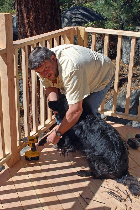 DSC_0139.JPG - An old dog CAN learn new tricks.  Here, Mark instructs his canine friend in the use of the drill.