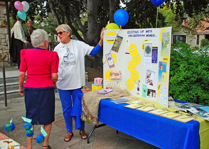 79.jpg - Two Very Presbyterian Women, with the PW display.