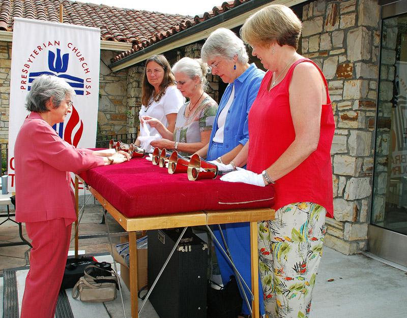 97.jpg - Volunteer bell ringers call us to our Rally Day.