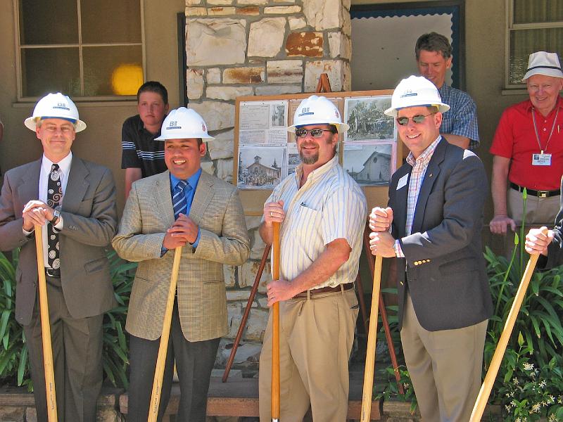 110.jpg - Architectural and contractor representatives take their turn at the shovels.
