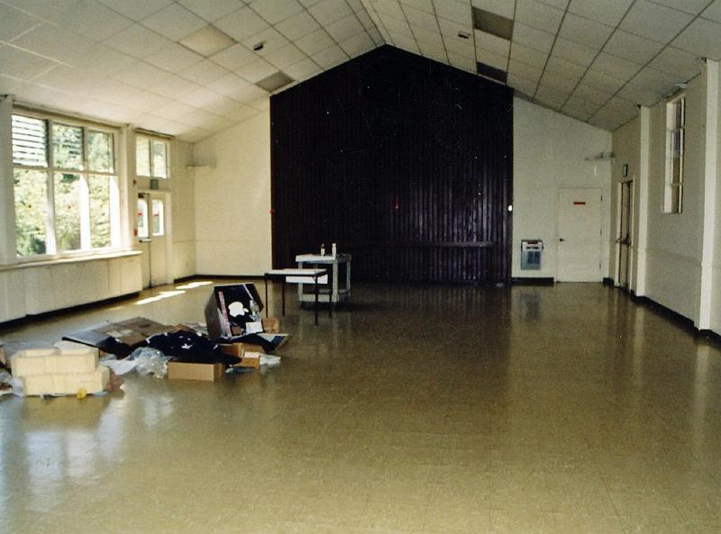 201.jpg - The Social Hall is emptied in preparation for its remodeling.  This view looks toward the Sanctuary.  Windows on the left look out on the inner courtyard between the church and Roycott House.