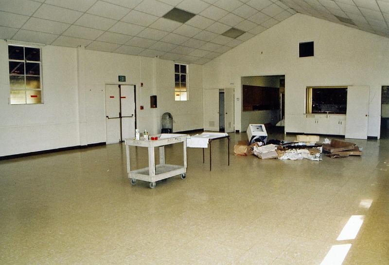 202.jpg - Another view of the Social Hall, now looking toward the Chapel.  The old kitchen is just beyond the pass-through window at the center right.