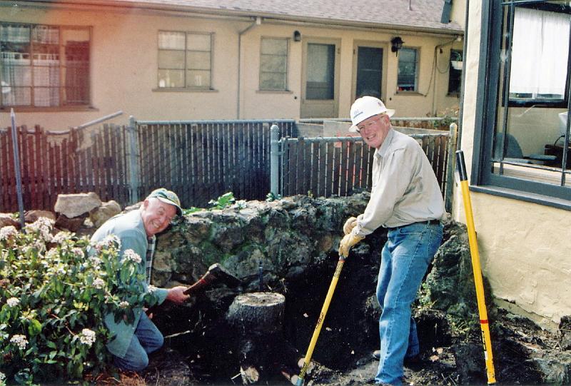 304.jpg - Lawrence Summers (left) and Art Holtz gave generously of their time throughout the remodeling process.  Here they are at work behind Lincoln House.