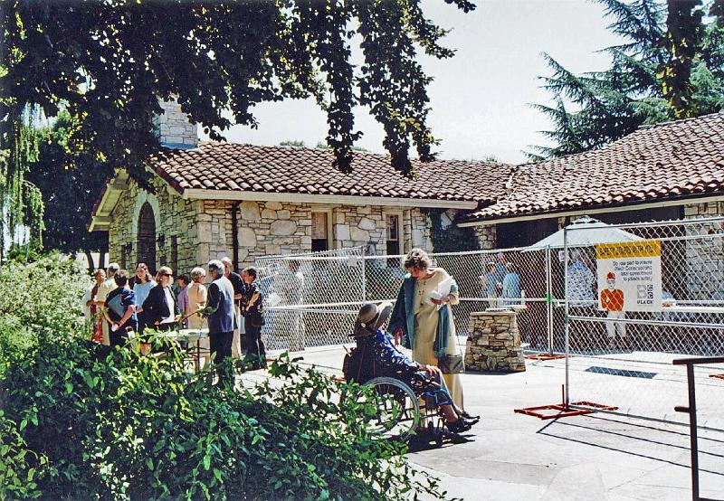 306.jpg - More gather for Sunday Worship and socializing.  Everyone worked around limited space provided during construction.