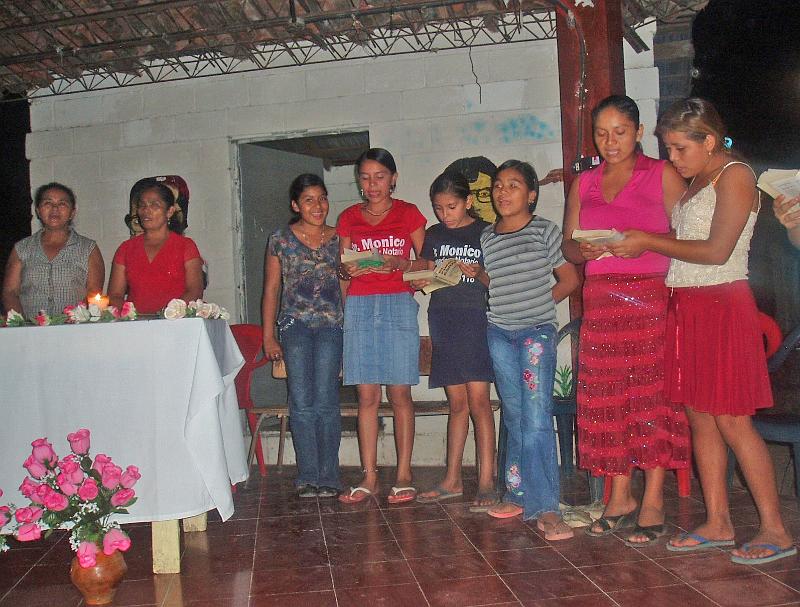 A082.jpg - COO Pastoral Team and youth choir led in worship.