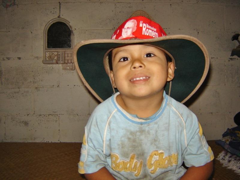 J072.jpg - Jose is a member of Pastor Pineras family, who hosted John Bayer during our stay in Comunidad Octavio Ortiz.  (Jose is shown wearing Johns hat.)
