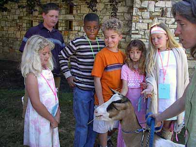 Church school youth with goat
